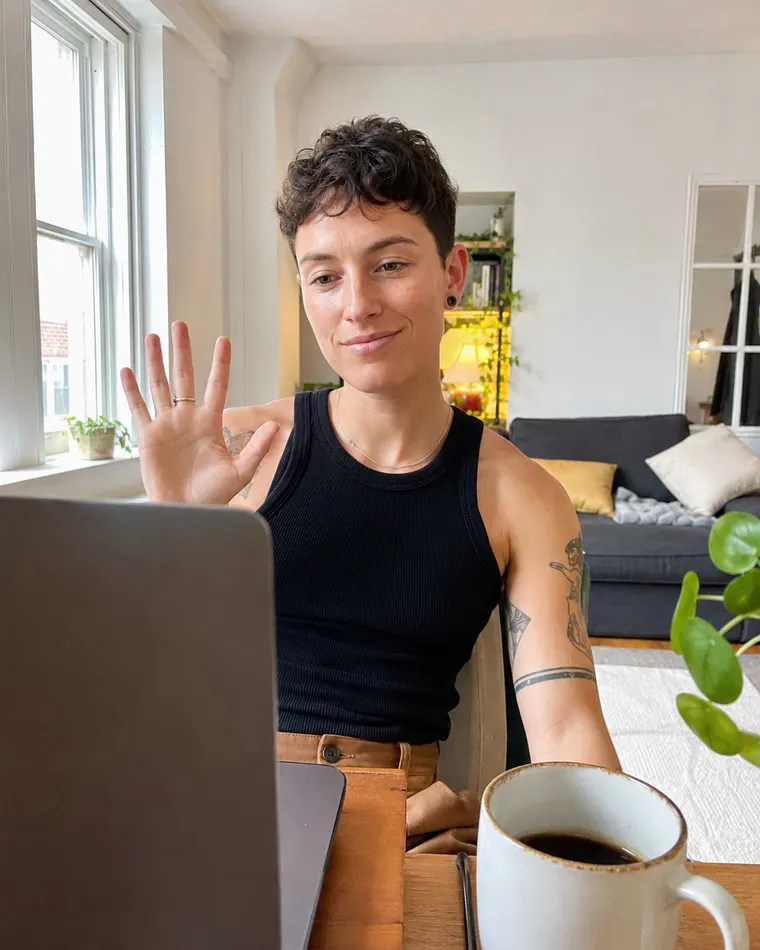 A person reviewing private online PrEP navigation options on a laptop at home